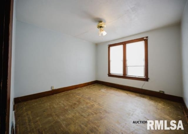 empty room with baseboards