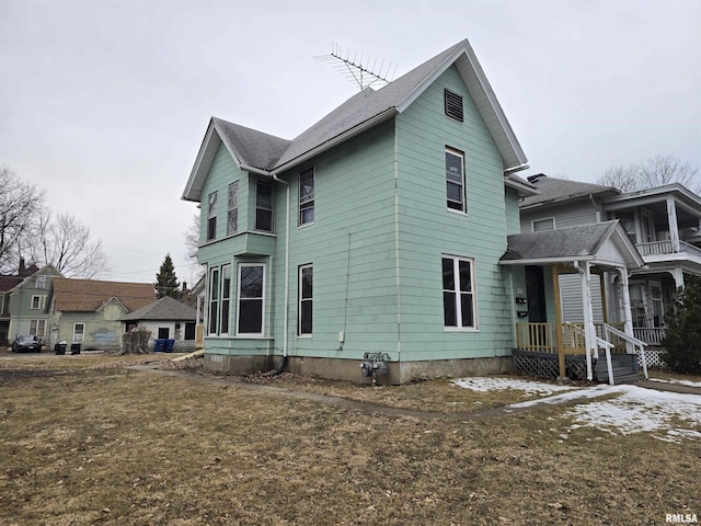 view of property exterior with a yard