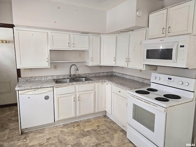 kitchen featuring light countertops, white appliances, white cabinetry, and a sink