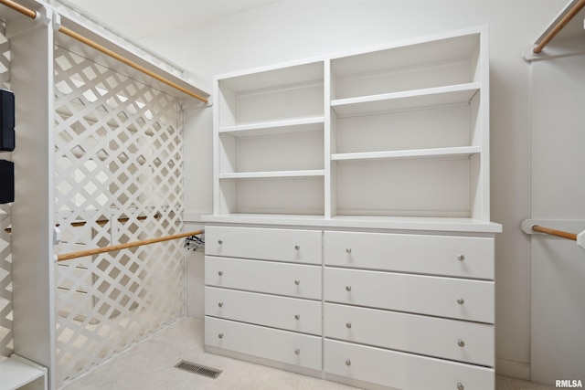 walk in closet featuring visible vents