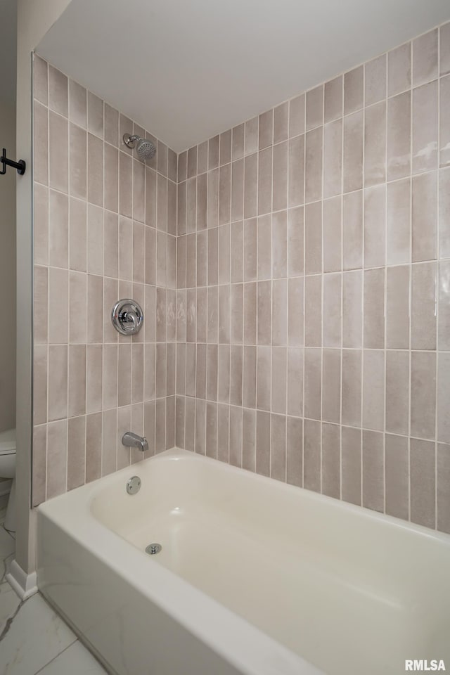 full bathroom featuring  shower combination and toilet