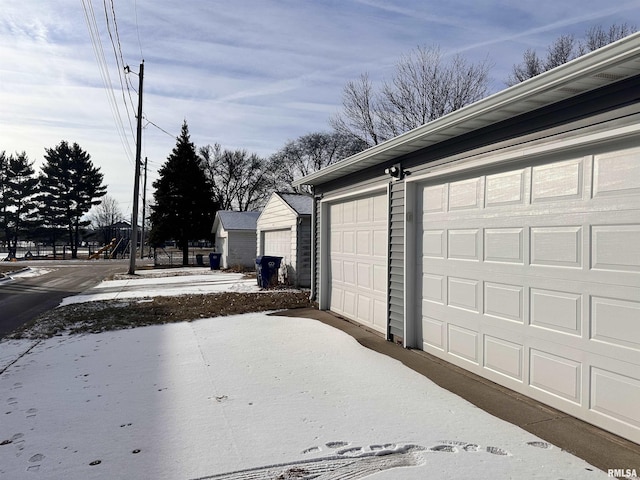 view of snow covered garage