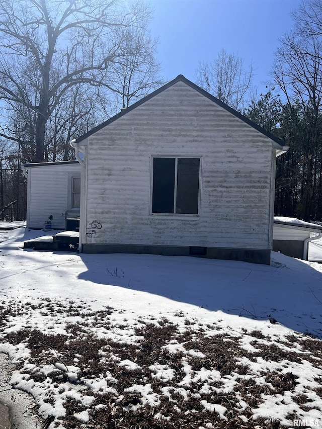 view of snow covered property