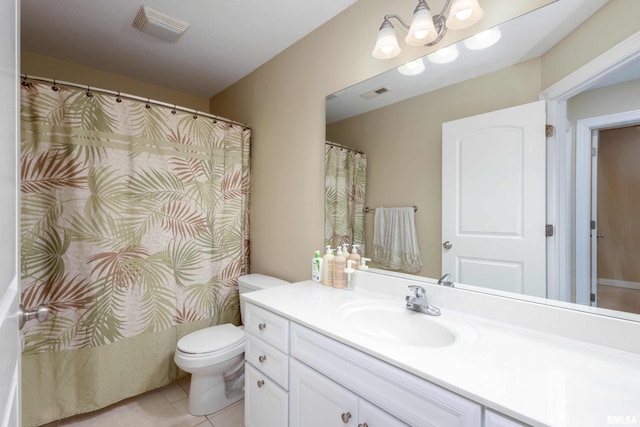 full bathroom with visible vents, vanity, toilet, and tile patterned floors