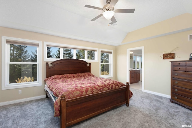 bedroom featuring carpet floors, visible vents, vaulted ceiling, and baseboards