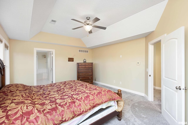 carpeted bedroom with visible vents, vaulted ceiling, baseboards, and ceiling fan