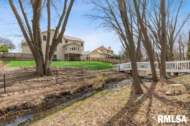 view of yard featuring fence