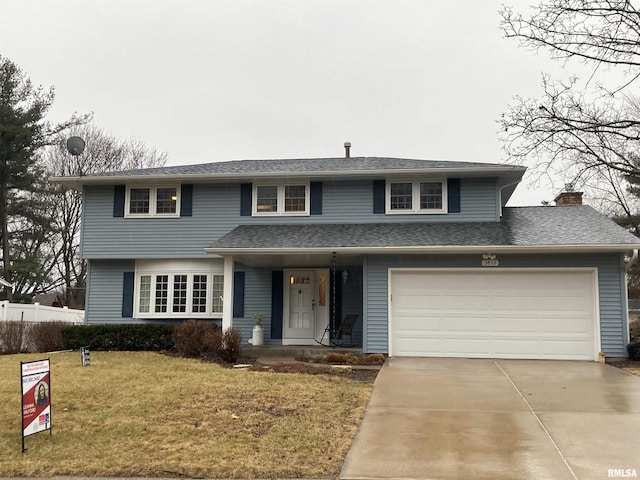 traditional-style home with a porch, roof with shingles, concrete driveway, and a front yard