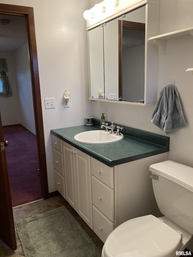 half bath with toilet and vanity