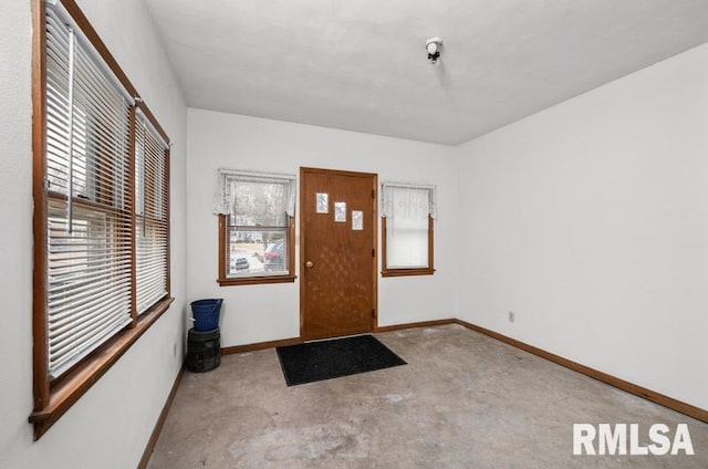 entrance foyer featuring baseboards