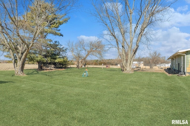 view of yard featuring fence