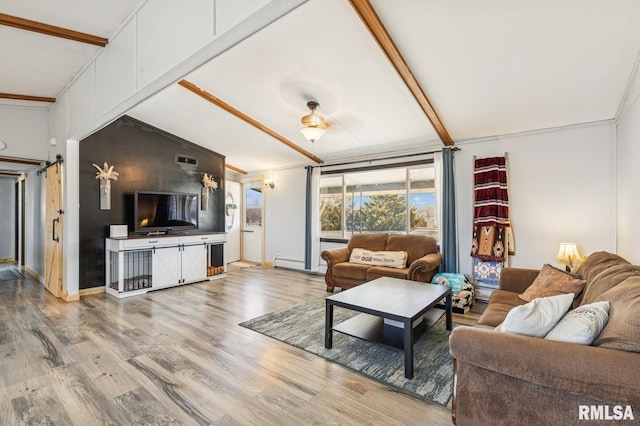 living room featuring vaulted ceiling with beams, a baseboard radiator, wood finished floors, and baseboards