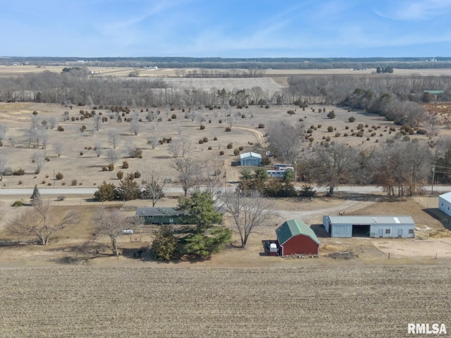 birds eye view of property featuring a desert view and a rural view