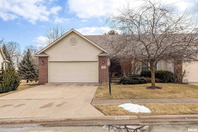 single story home with a garage, concrete driveway, brick siding, and a front lawn