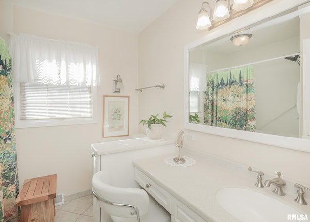 full bath featuring a shower with curtain, tile patterned flooring, baseboards, and vanity