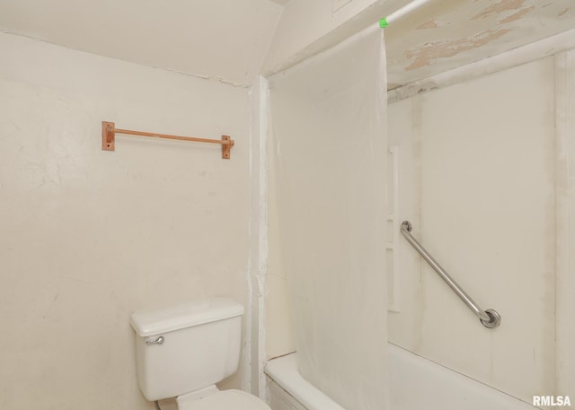 bathroom with toilet and shower / tub combo