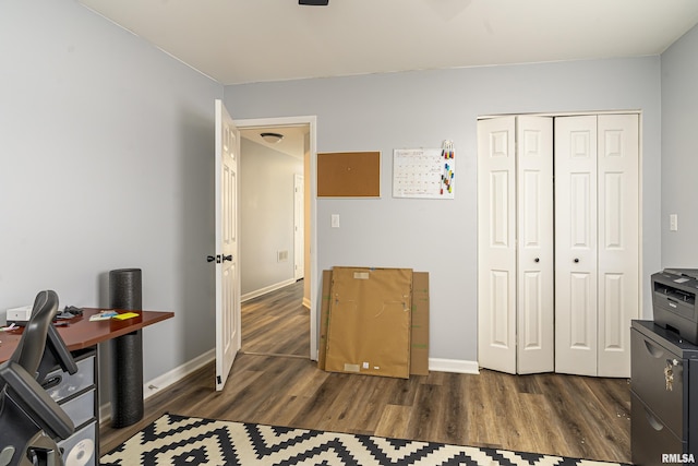 office area with wood finished floors and baseboards