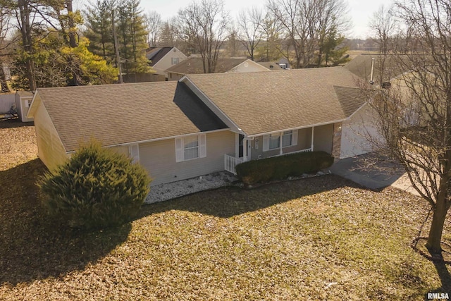 view of front facade featuring a shingled roof