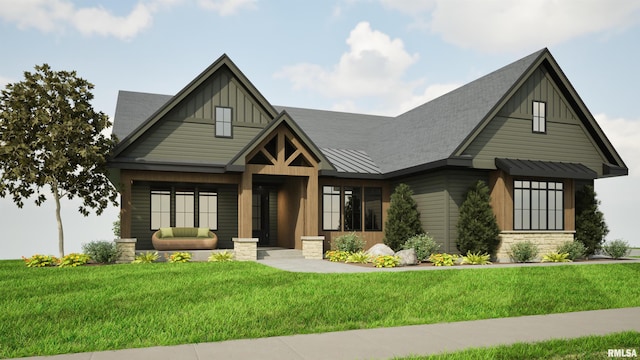 view of front of home with stone siding, metal roof, a standing seam roof, a front lawn, and board and batten siding