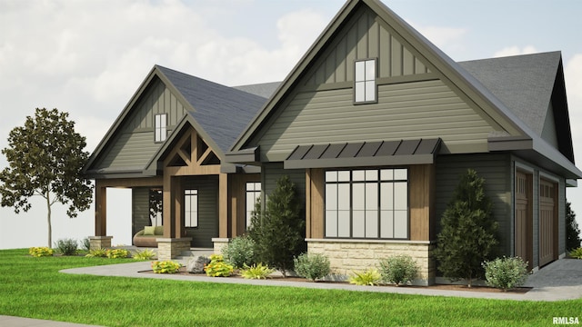 view of front facade featuring board and batten siding, roof with shingles, and a front lawn