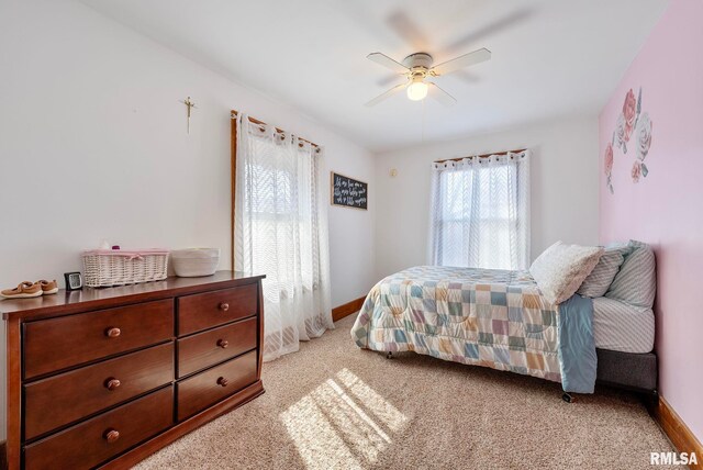 bedroom featuring carpet floors, baseboards, and a ceiling fan