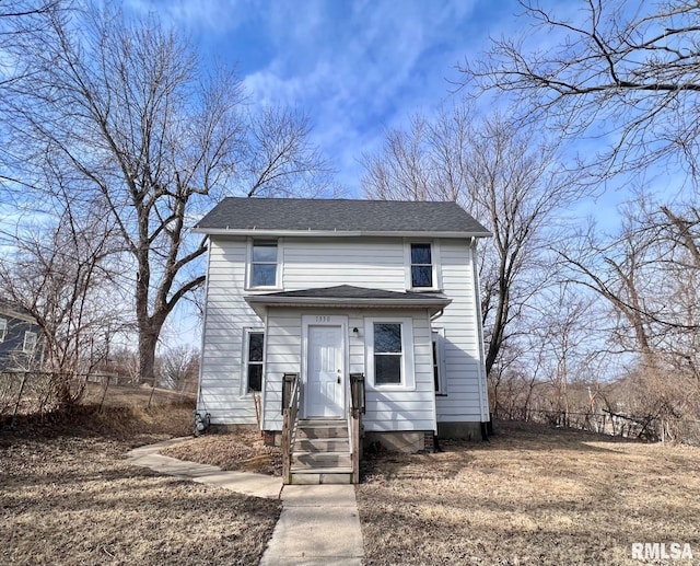 view of front of home with roof with shingles