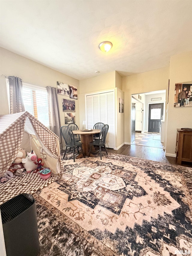 interior space with baseboards and a closet