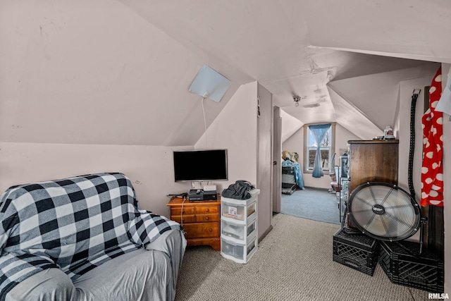 interior space featuring carpet flooring and lofted ceiling