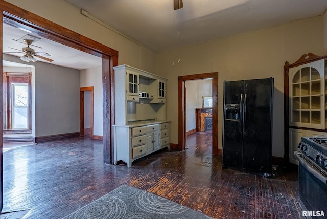 kitchen with black appliances, glass insert cabinets, dark wood-style flooring, and a ceiling fan