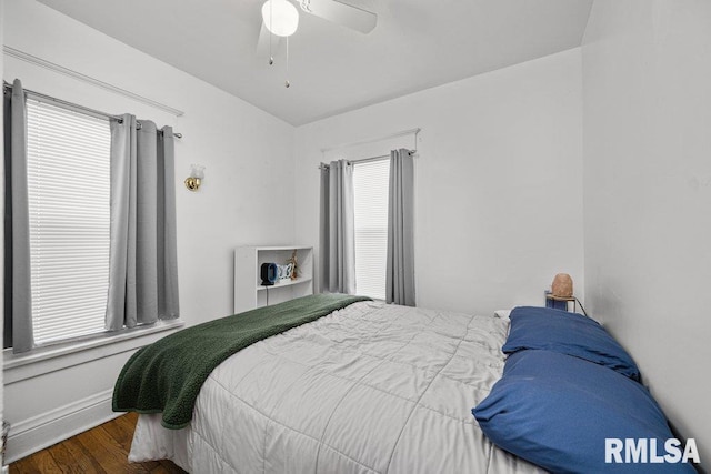 bedroom featuring ceiling fan and wood finished floors