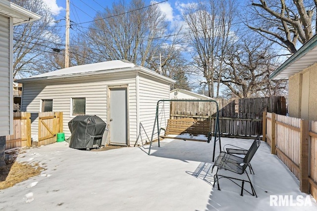 view of patio featuring fence and area for grilling