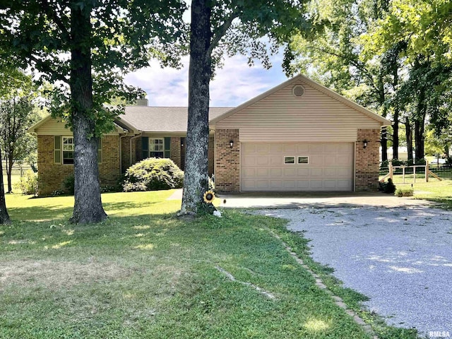 ranch-style home with a garage, a front yard, gravel driveway, and brick siding