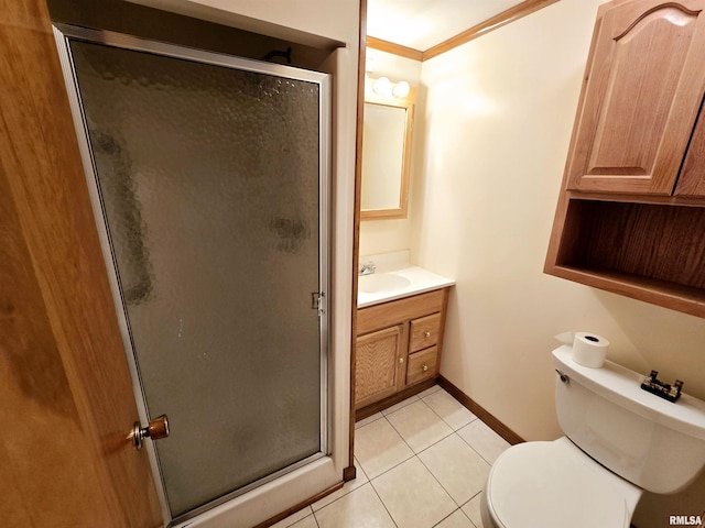 full bathroom with ornamental molding, tile patterned flooring, a shower stall, and vanity