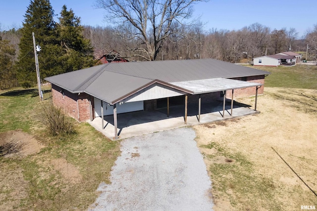 1595 Casper Church Rd, Cobden, IL 62920 - view of outdoor structure with an attached carport and gravel driveway