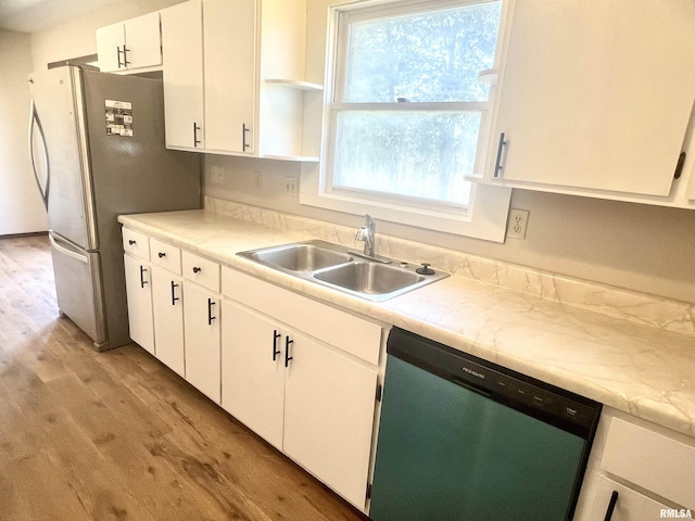 1595 Casper Church Rd, Cobden, IL 62920 - kitchen with light wood-style flooring, a sink, open shelves, white cabinetry, and dishwasher