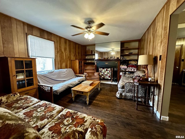 bedroom with wood finished floors and wooden walls