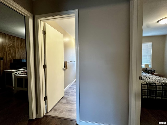 corridor with wood finished floors