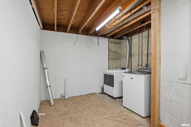 laundry area with laundry area and washer and dryer