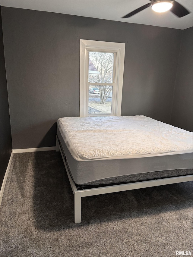 bedroom featuring carpet flooring, ceiling fan, and baseboards