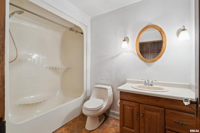 bathroom featuring toilet and vanity