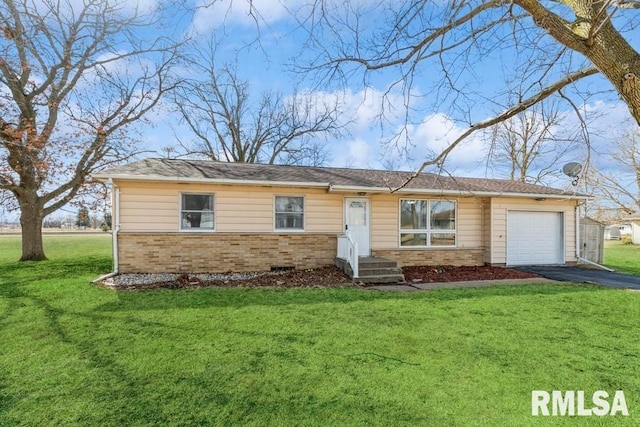 ranch-style house featuring an attached garage, a front lawn, aphalt driveway, and brick siding