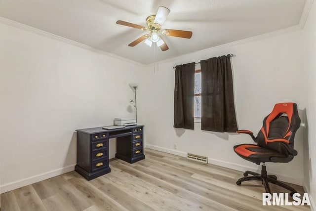 office space featuring visible vents, crown molding, and light wood-style flooring