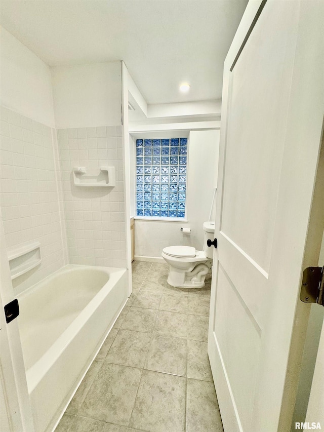 114 Dewhurst St, Savanna, IL 61074 - full bathroom featuring toilet and tile patterned flooring
