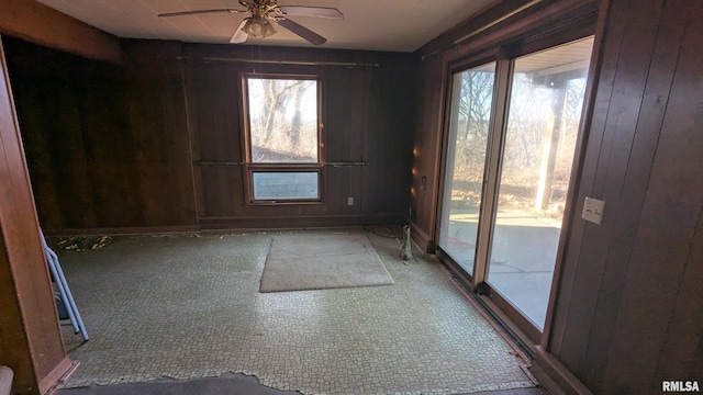 empty room featuring ceiling fan