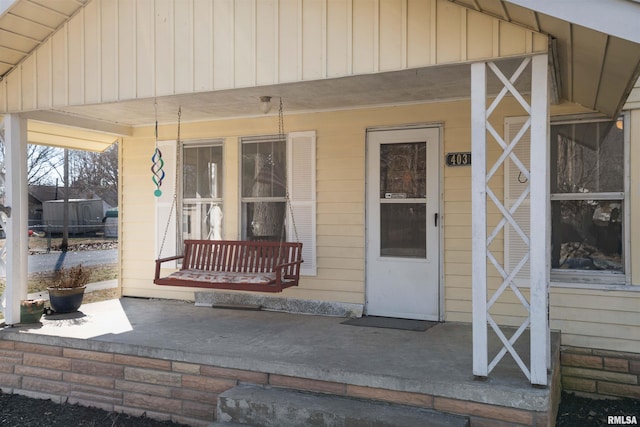 property entrance featuring covered porch