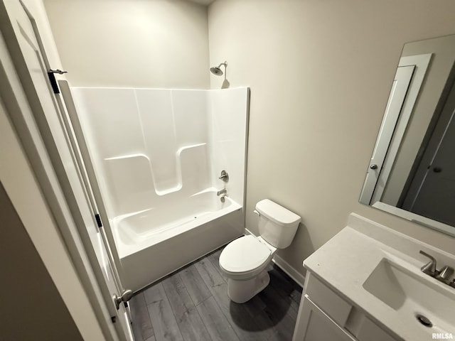 1631 Westport Dr, Davenport, IA 52804 - bathroom with vanity, washtub / shower combination, and wood finished floors