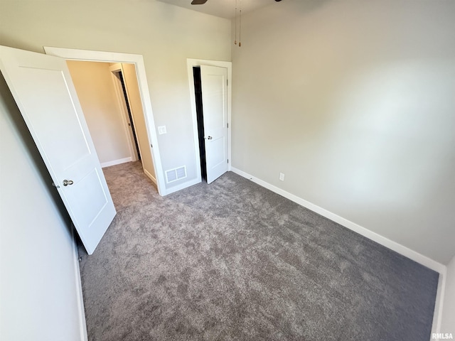1631 Westport Dr, Davenport, IA 52804 - unfurnished bedroom with carpet flooring and baseboards