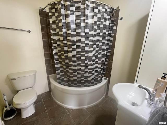 full bath with a sink, tile patterned floors, toilet, and a shower with curtain