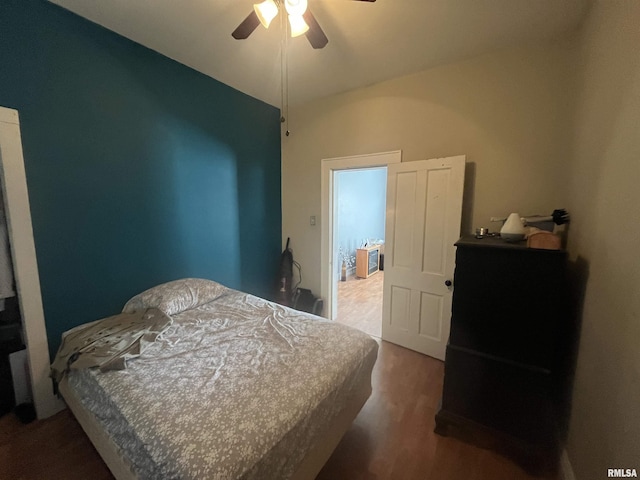 bedroom featuring ceiling fan and wood finished floors