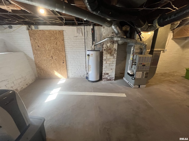 unfinished below grade area with gas water heater and heating unit